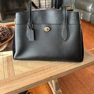 Black like new pebbled leather tote in excellent condition